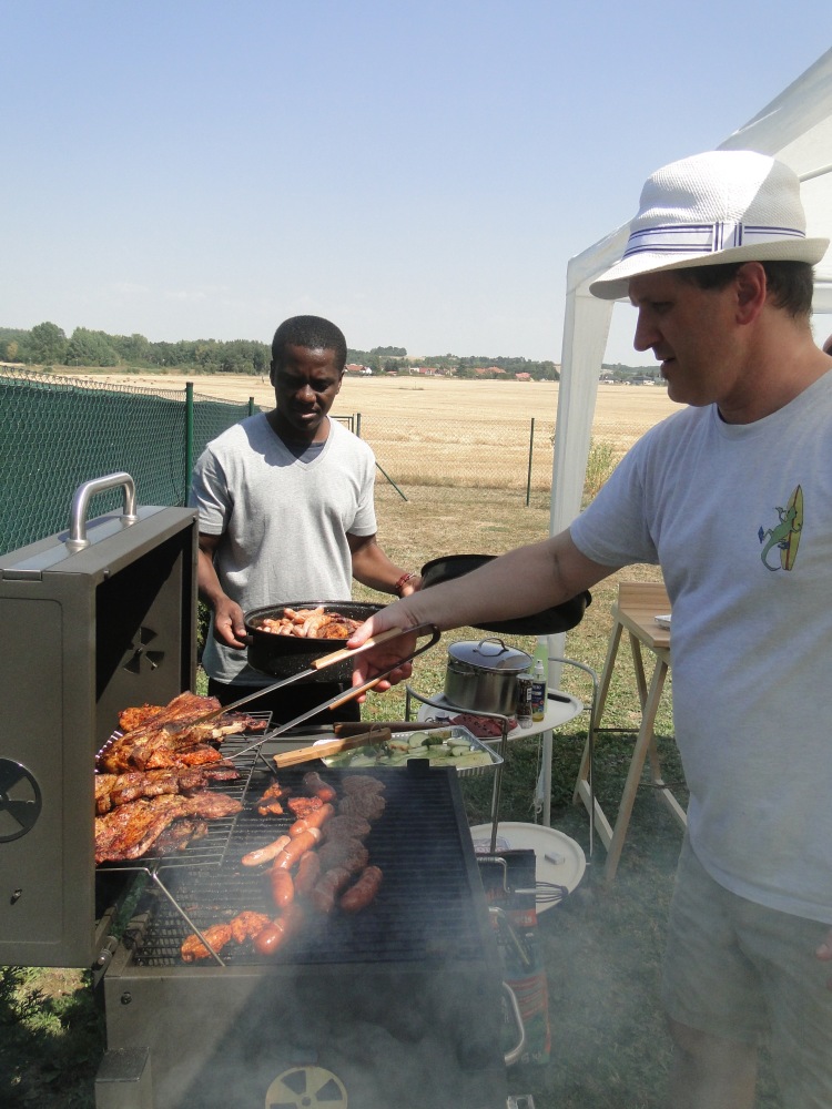 Gerardo and Baffour manning the grill on a very hot day in Prague!